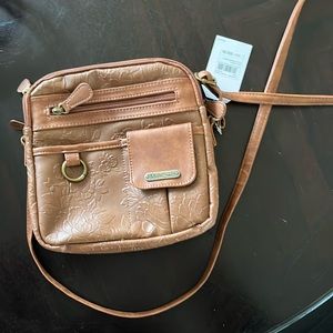 Multisite new so many pockets with a floral imprint on it